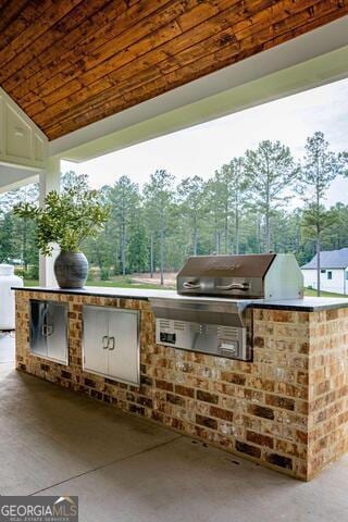 211 Hogan Coweta Rd, Hogansville, GA 30230 - view of storm shelter featuring a patio