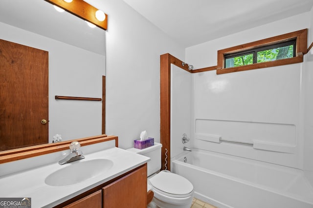 bathroom with toilet, vanity, tub / shower combination, and tile patterned flooring