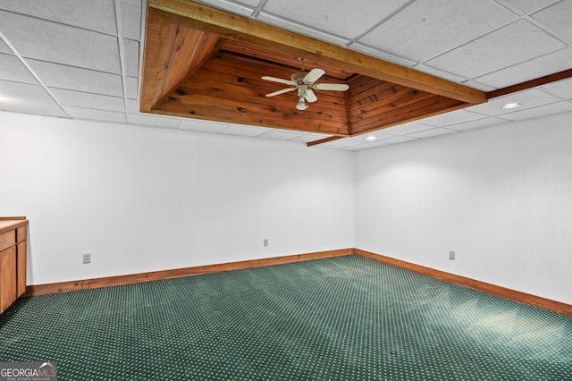 spare room featuring carpet, baseboards, a ceiling fan, recessed lighting, and a paneled ceiling