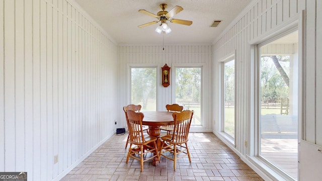 1717 Grady Saunders Rd, Portal, GA 30450 - sunroom / solarium with visible vents, ornamental molding, brick floor, and a healthy amount of sunlight