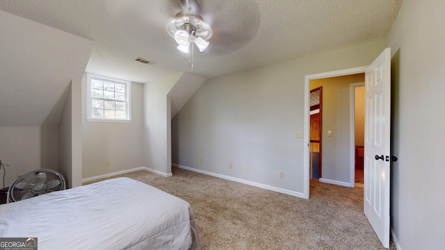 1717 Grady Saunders Rd, Portal, GA 30450 - carpeted bedroom featuring visible vents, a ceiling fan, a textured ceiling, and baseboards