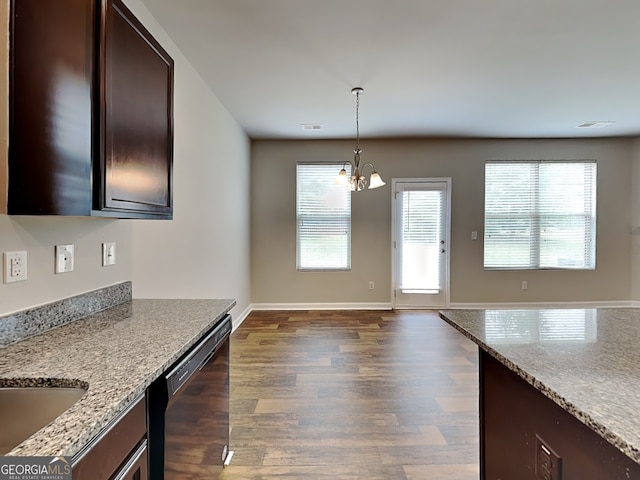 1392 Worcester Trl, Mcdonough, GA 30253 - unfurnished dining area featuring a chandelier, dark wood finished floors, healthy amount of natural light, and baseboards