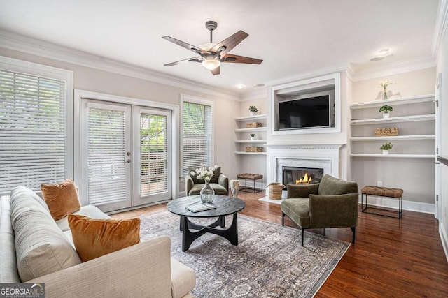 75 High Top Ln, Sandy Springs, GA 30328 - living room featuring ornamental molding, a ceiling fan, a glass covered fireplace, wood finished floors, and french doors