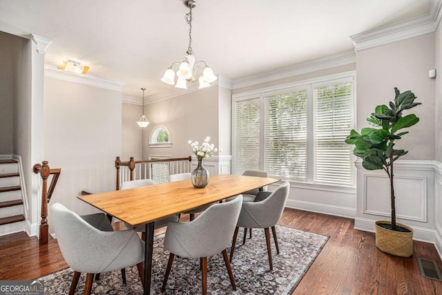 75 High Top Ln, Sandy Springs, GA 30328 - dining room with plenty of natural light, a chandelier, dark wood-style floors, stairs, and a wainscoted wall
