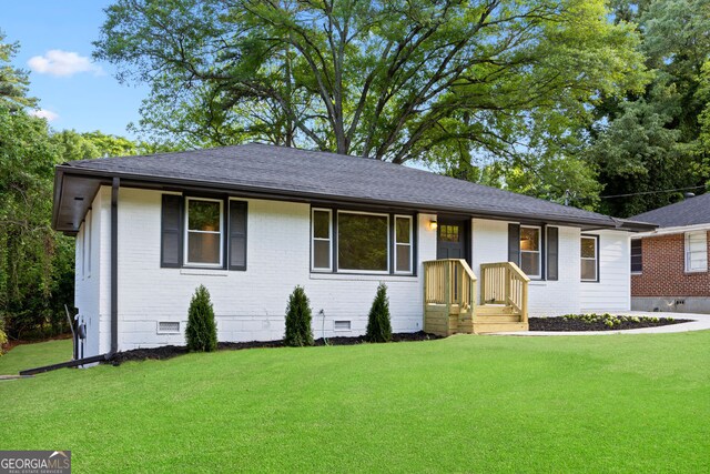 2805 Long Way, Decatur, GA 30032 - ranch-style home with crawl space, a front lawn, brick siding, and a shingled roof