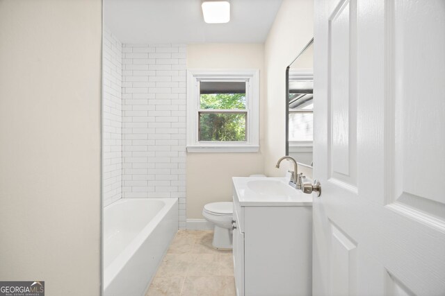 bathroom with toilet, tile patterned floors, and vanity