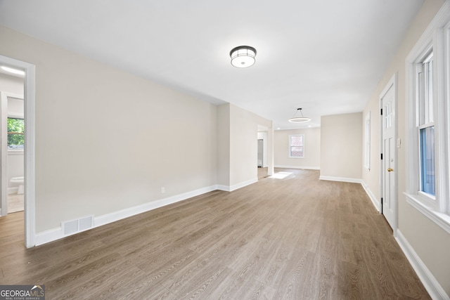 2805 Long Way, Decatur, GA 30032 - unfurnished living room with wood finished floors and baseboards