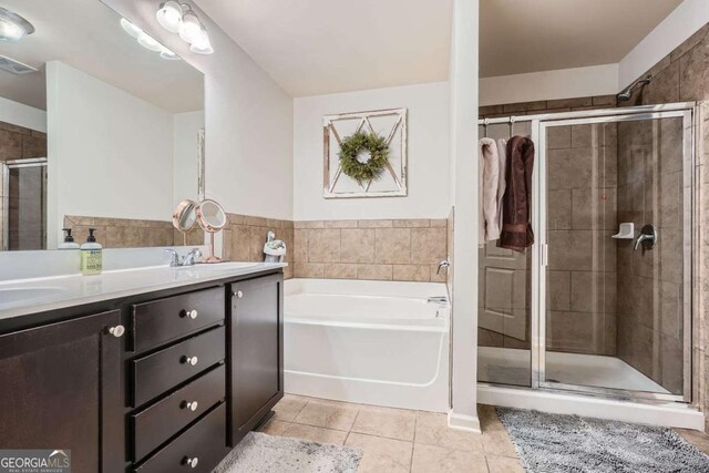 full bathroom featuring tile patterned flooring, vanity, a shower stall, visible vents, and a bath