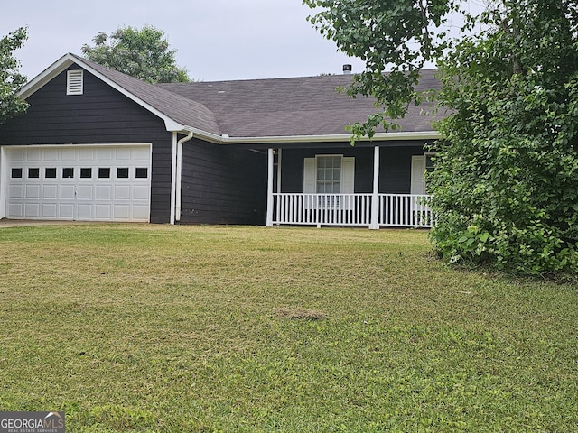 ranch-style house featuring a garage, a shingled roof, a porch, and a front yard