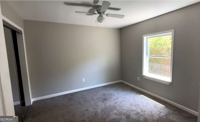 50 Ivy St, Porterdale, GA 30014 - carpeted empty room featuring baseboards and ceiling fan