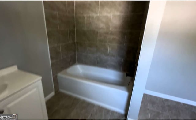 50 Ivy St, Porterdale, GA 30014 - bathroom with shower / bathtub combination, baseboards, and vanity