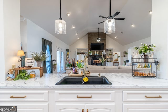 51 Montview Ct, Ringgold, GA 30736 - kitchen featuring a sink, a fireplace, open floor plan, high vaulted ceiling, and a ceiling fan