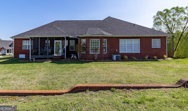 51 Montview Ct, Ringgold, GA 30736 - rear view of property featuring a lawn, a sunroom, central AC, and brick siding