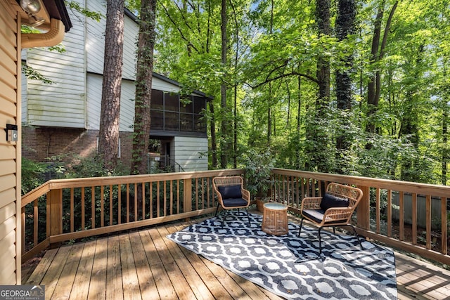 deck featuring a sunroom