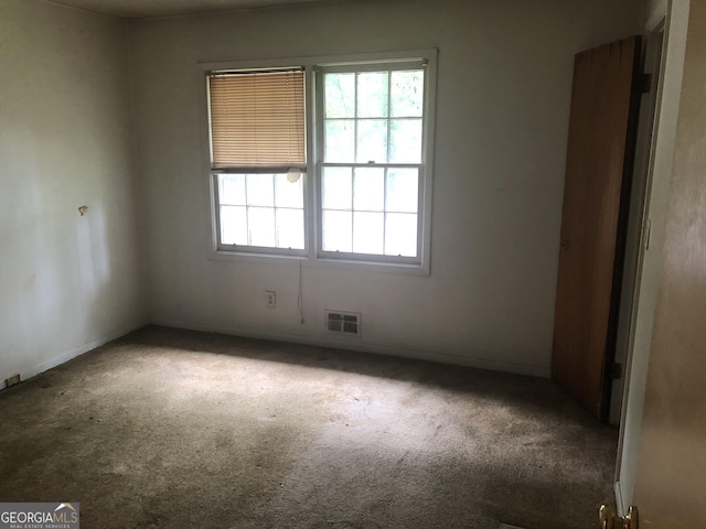 2017 Pine Cone Dr SW, Atlanta, GA 30331 - unfurnished room with carpet floors and baseboards
