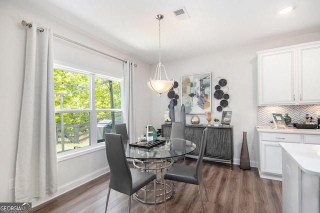 dining room featuring visible vents, recessed lighting, baseboards, and wood finished floors