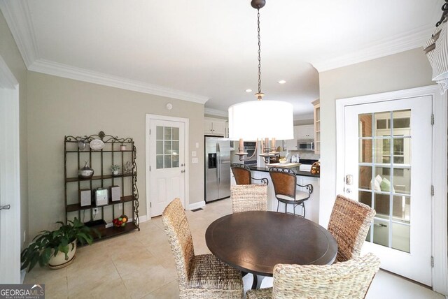 dining area with light tile patterned floors, baseboards, ornamental molding, and recessed lighting