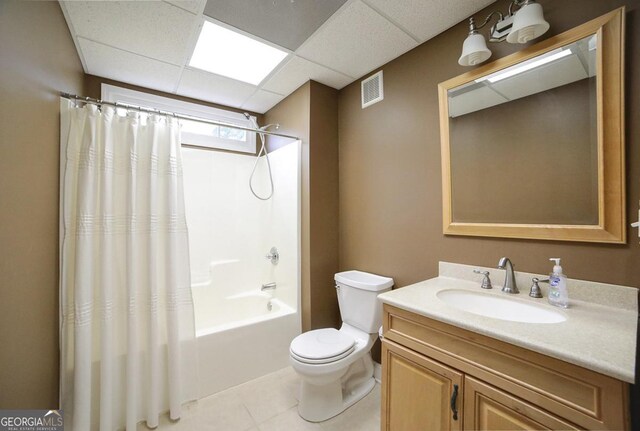 full bathroom featuring visible vents, tile patterned flooring, shower / bath combo, vanity, and toilet