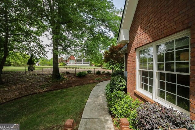 view of yard featuring fence