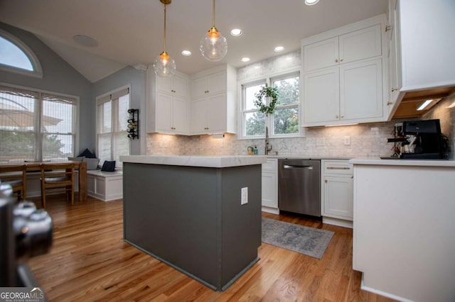 1745 Stripling Chapel Rd, Carrollton, GA 30116 - kitchen with stainless steel dishwasher, white cabinetry, and light countertops
