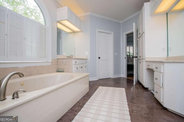 1745 Stripling Chapel Rd, Carrollton, GA 30116 - full bathroom with crown molding, connected bathroom, a garden tub, and vanity
