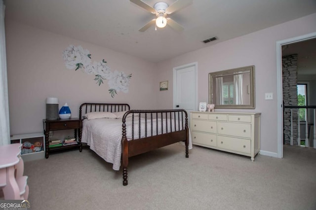 1745 Stripling Chapel Rd, Carrollton, GA 30116 - bedroom featuring baseboards, visible vents, light carpet, and ceiling fan