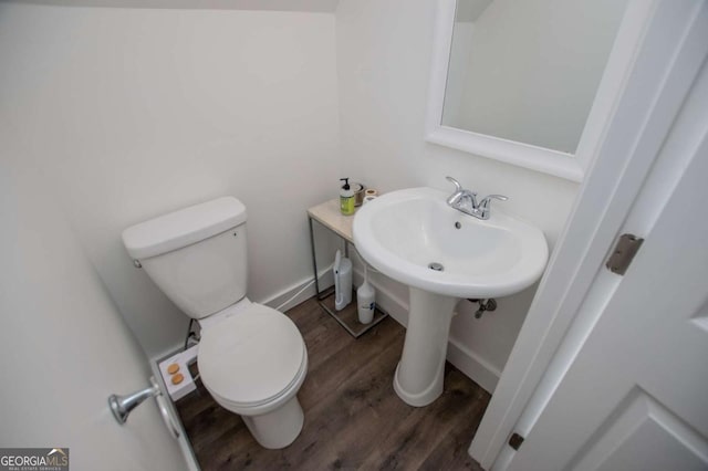 1745 Stripling Chapel Rd, Carrollton, GA 30116 - bathroom featuring toilet and wood finished floors