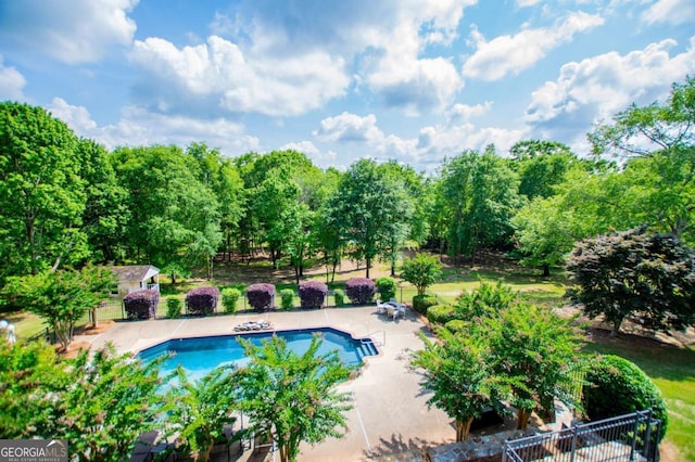 1745 Stripling Chapel Rd, Carrollton, GA 30116 - outdoor pool featuring fence and a patio area