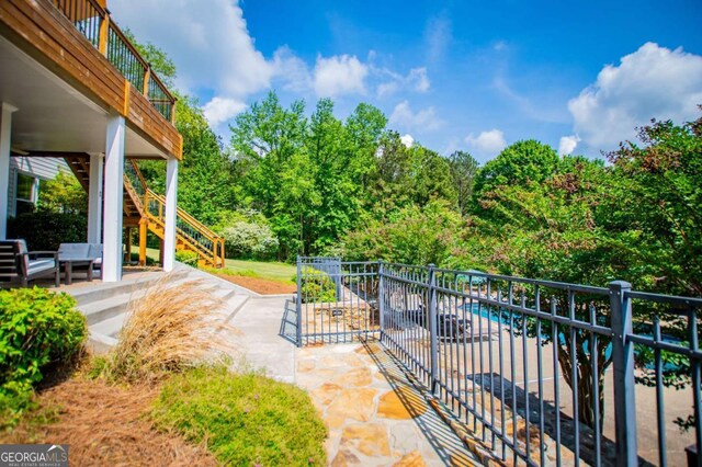 1745 Stripling Chapel Rd, Carrollton, GA 30116 - view of patio / terrace featuring stairs, an outdoor living space, and a balcony