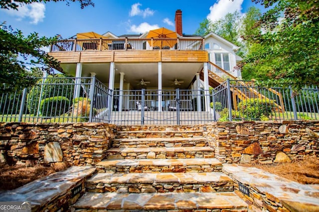 1745 Stripling Chapel Rd, Carrollton, GA 30116 - view of front of property featuring ceiling fan, fence, a balcony, a patio, and stairs