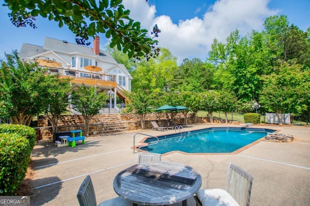 1745 Stripling Chapel Rd, Carrollton, GA 30116 - view of swimming pool with a patio, fence, stairway, and a fenced in pool