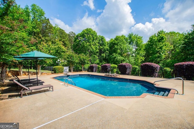 1745 Stripling Chapel Rd, Carrollton, GA 30116 - view of swimming pool with fence, a fenced in pool, a patio area, and a diving board