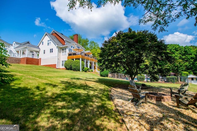 1745 Stripling Chapel Rd, Carrollton, GA 30116 - view of yard with fence, an outdoor fire pit, and a deck