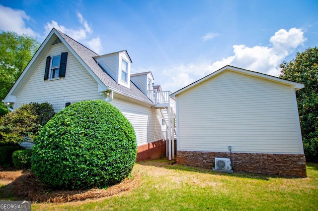 1745 Stripling Chapel Rd, Carrollton, GA 30116 - view of side of property featuring ac unit, a shingled roof, a balcony, and a yard
