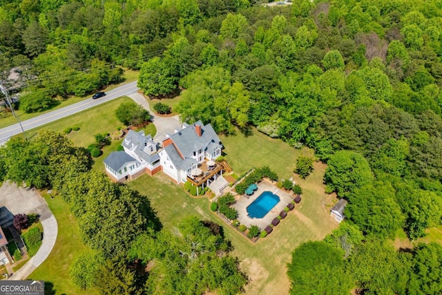 1745 Stripling Chapel Rd, Carrollton, GA 30116 - drone / aerial view with a wooded view