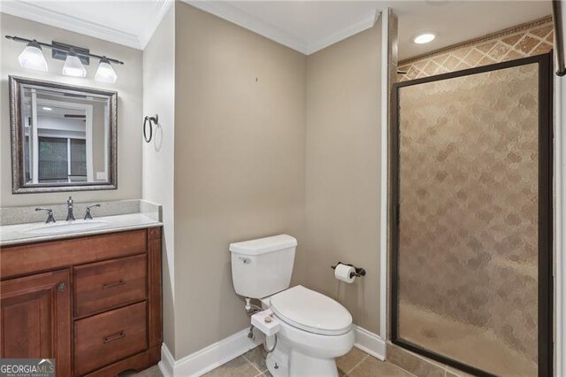 full bathroom with baseboards, ornamental molding, toilet, and a shower stall