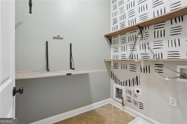 washroom featuring laundry area, tile patterned flooring, baseboards, hookup for a washing machine, and hookup for an electric dryer
