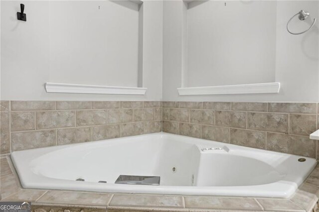 bathroom featuring a whirlpool tub