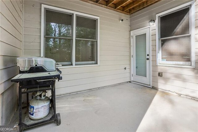 property entrance with a patio