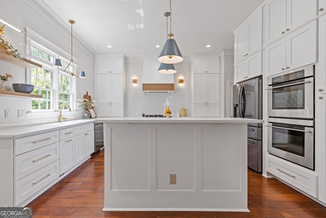 kitchen featuring open shelves, light countertops, dark wood finished floors, stainless steel appliances, and white cabinetry