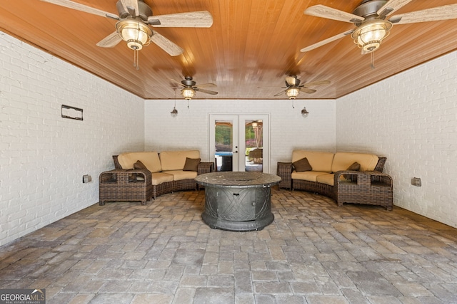 view of patio with a ceiling fan, french doors, and outdoor lounge area