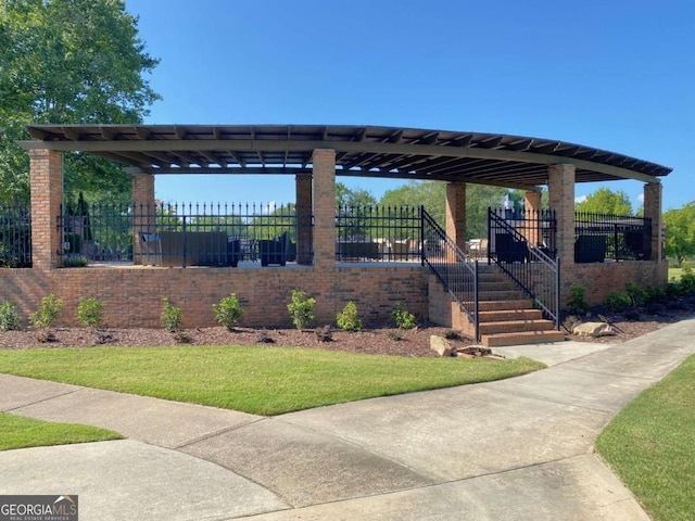 surrounding community featuring a yard and fence