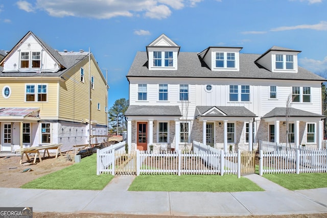 208 Village Overlook Unit J3, Canton, GA 30114 - townhome / multi-family property with a gate, a fenced front yard, and roof with shingles