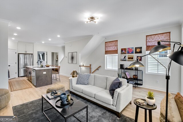 208 Village Overlook Unit J3, Canton, GA 30114 - living room featuring light wood-type flooring, recessed lighting, baseboards, and crown molding