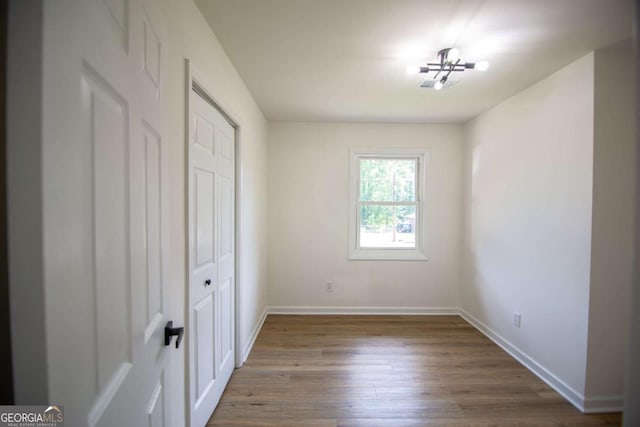 4074 Green Hawk Trl, Decatur, GA 30035 - unfurnished bedroom featuring dark wood finished floors, a closet, and baseboards