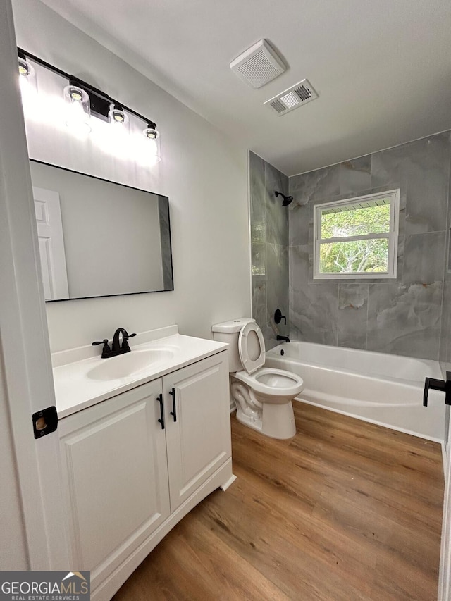 4074 Green Hawk Trl, Decatur, GA 30035 - bathroom with  shower combination, vanity, toilet, and wood finished floors