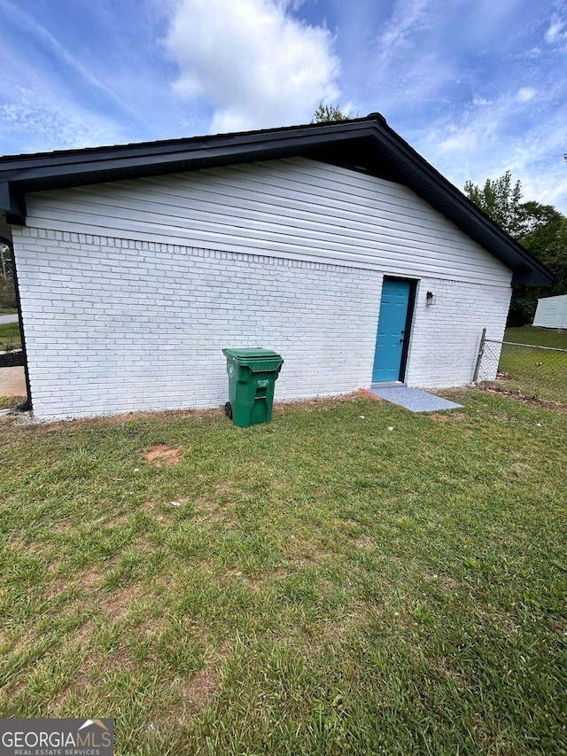 4074 Green Hawk Trl, Decatur, GA 30035 - view of home's exterior with brick siding and a lawn