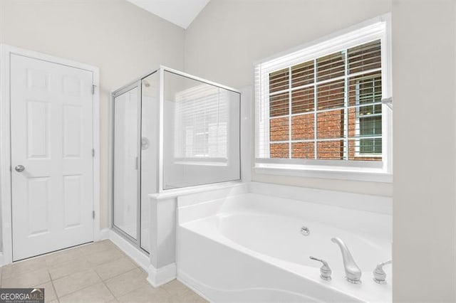 735 Scenic Creek Dr, Lawrenceville, GA 30046 - bathroom featuring a stall shower, a bath, and tile patterned flooring