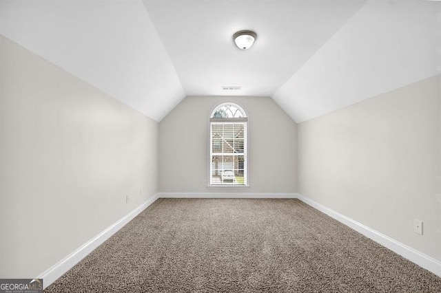 735 Scenic Creek Dr, Lawrenceville, GA 30046 - additional living space with carpet floors and lofted ceiling