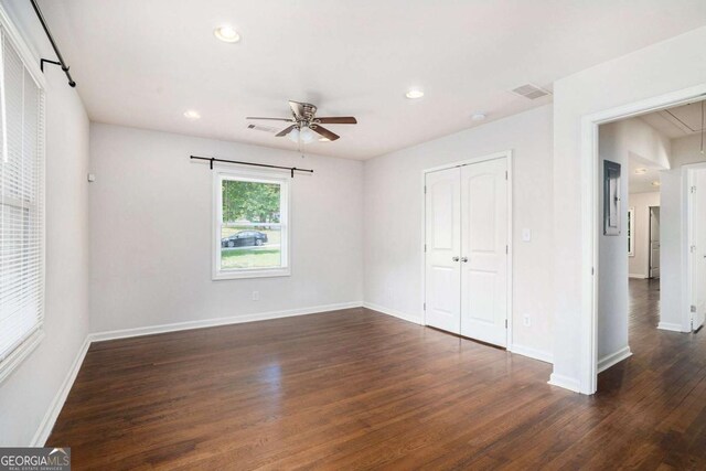 unfurnished bedroom featuring recessed lighting, baseboards, visible vents, and wood finished floors